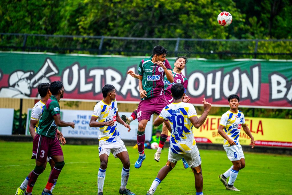 Mohun Bagan player trying to soce by heading