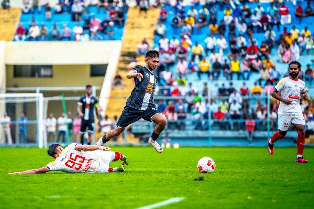 Mohammedan SC's Israfil in action against Diamond Harbour FC in CFL 2024