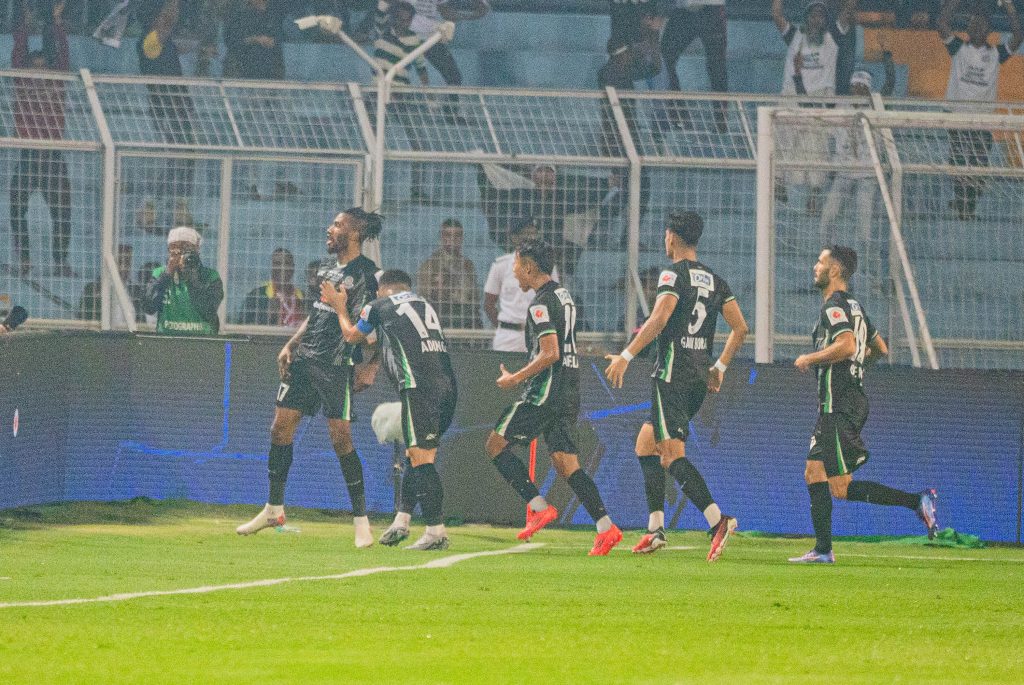 Manzoki after scoring the opener goal