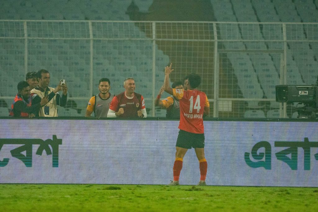 David celebrating after scoring against Punjab