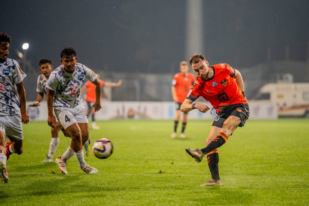 Nikola taking shot to score goal against Delhi FC