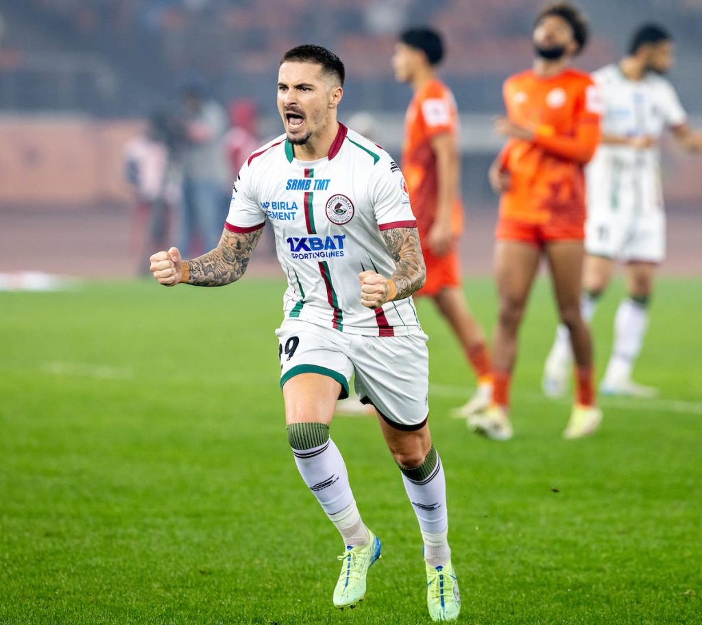 Maclaren celebrating after scoring against Punjab FC
