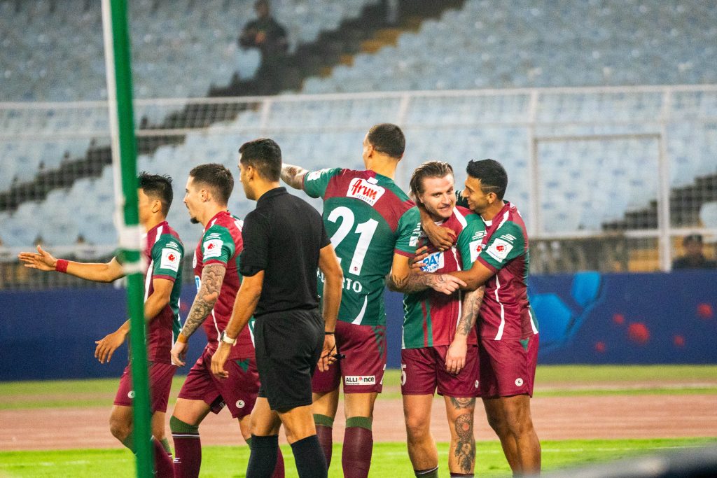 Cummins and other Mohun Bagan players celebrating after scoring against Hyderabad FC