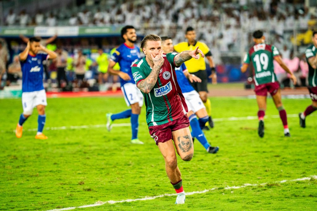 Jason Cummins after scoring from Penalty