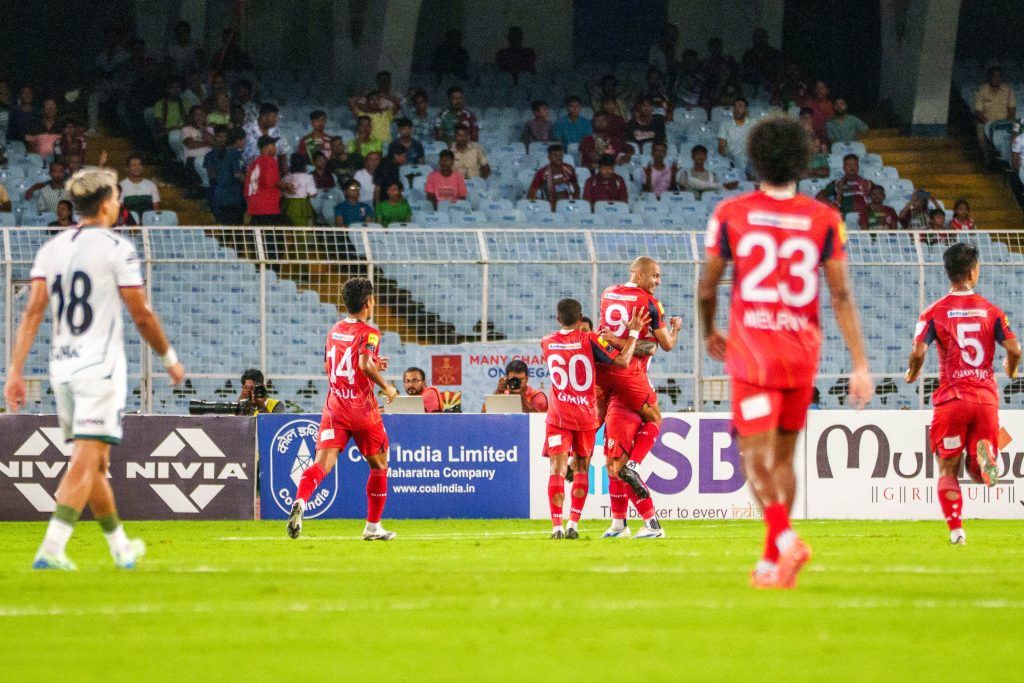 Luka and Diamond Harbour FC players celebrating after scoring