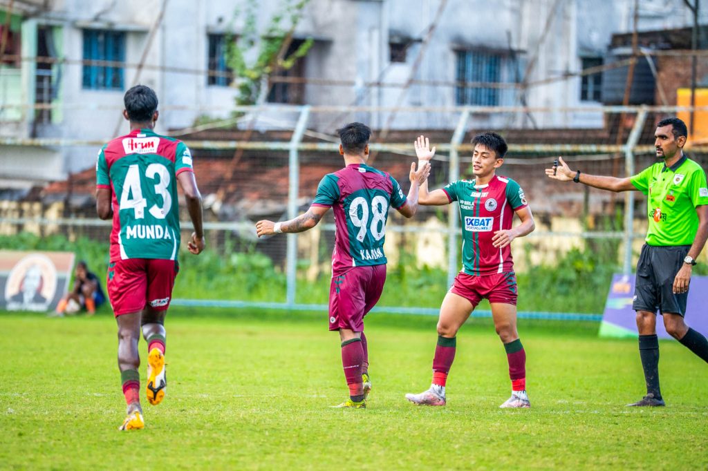 Karan Rai and Mohun Bagan players celebrating after Karan Rai scored from another free kick