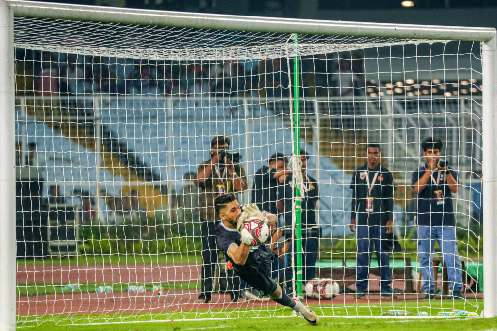 Vishal Kaith saving penalty shootout.