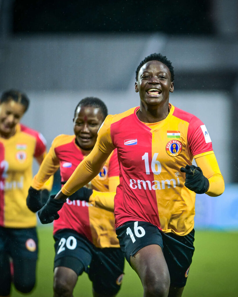 Resty Nanziri celebrating after scoring