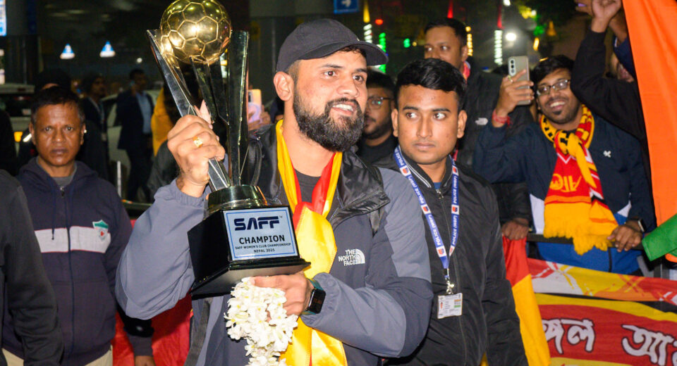 East Bengal FC coach with SAFF Championship trophy