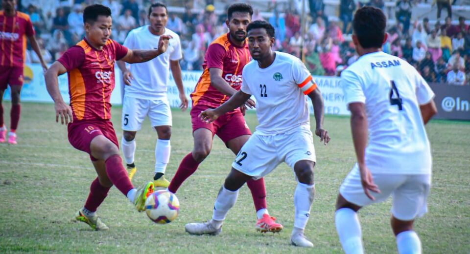 Defending champions West Bengal topped Group A unbeaten after a gritty 1–1 draw with Assam, showing defensive strength in Santosh Trophy 2026.