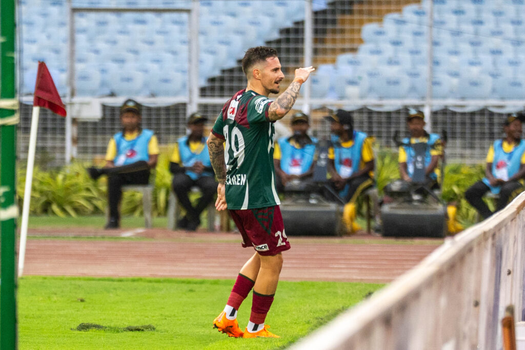 MacLaren of Mohun Bagan SG after scoring the 1st goal