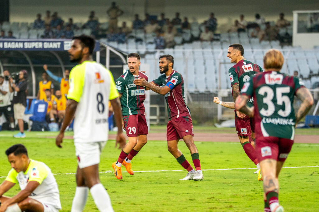 McLaren celebrating after scoring his 2nd goal 
