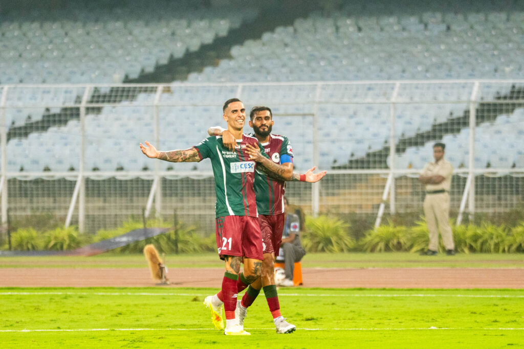 Rodrigez celebrating after scoring 
