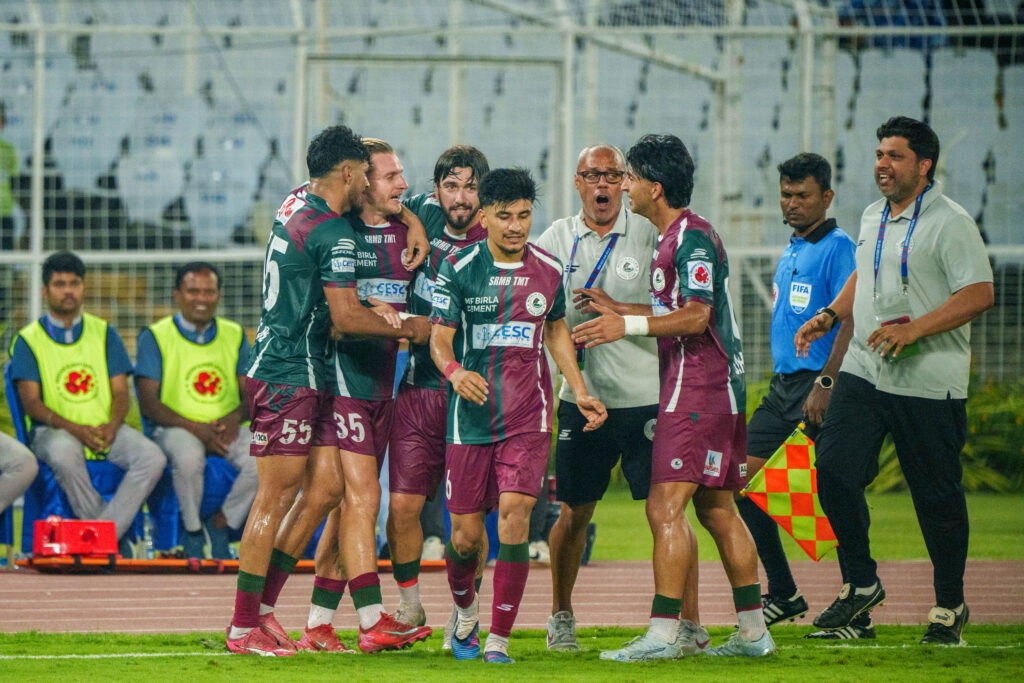 Json Cummins after scoring from free kick