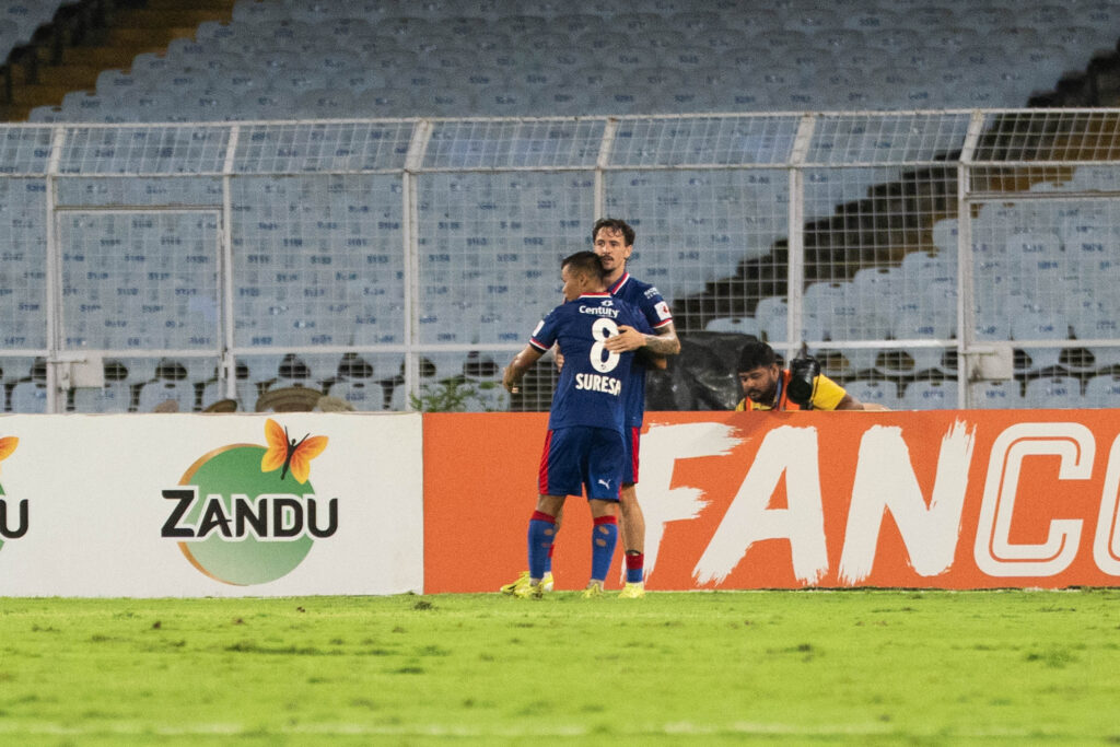 Suresh celebrating after scoring