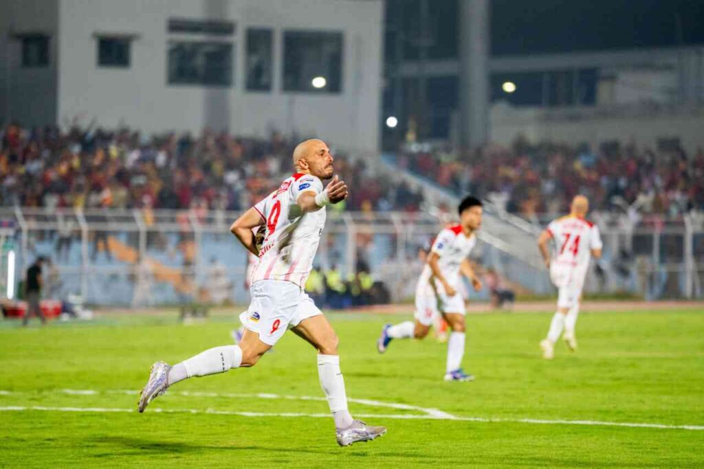 Youssef Ezzejjari after scoring the equalizer