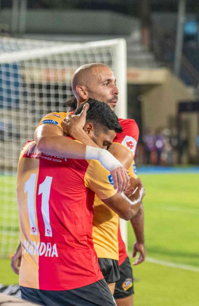 Yousef celebrating Nandha's goal with Nandha