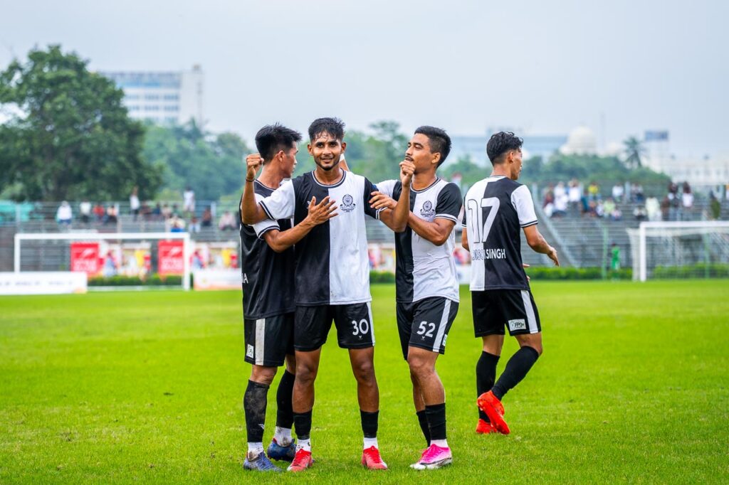 Israfil Dewan celebrating his goal with Mohammedan SC teammates