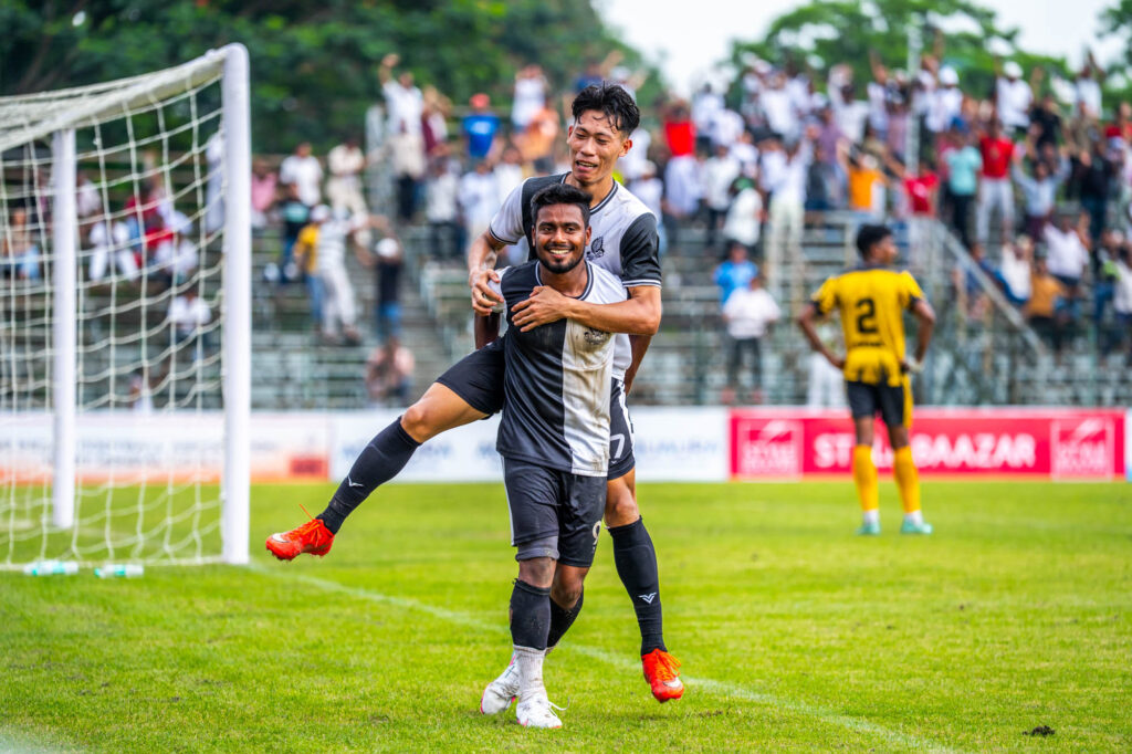 Fardin celebrating his goal with Adison
