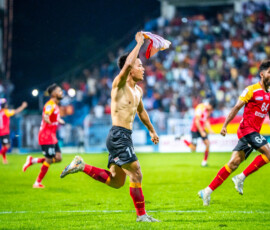 David of East Bengal celebrating āafter scoring the third and decisive goal